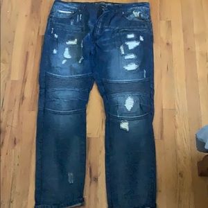 Blue distressed denim jeans